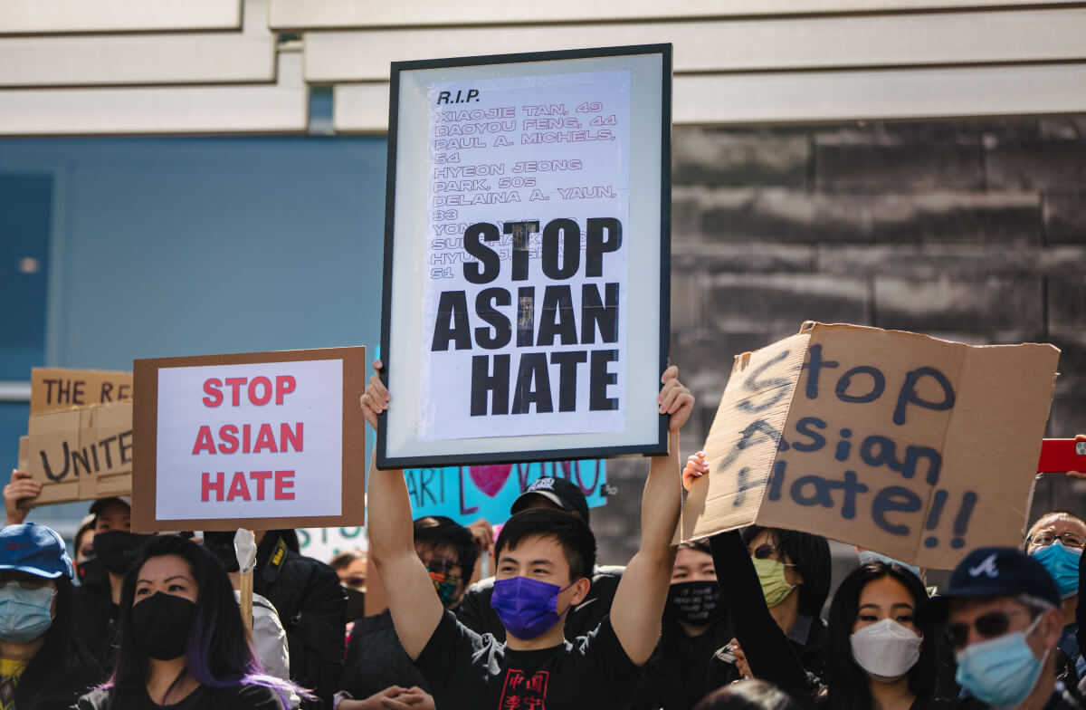 protestors demanding stop asian hate